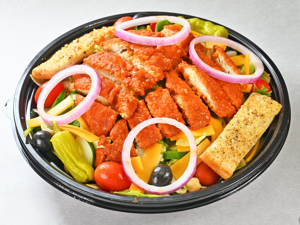 chicken finger salad with buffalo sauce